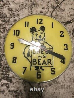 Vintage Line Up With Bear Electric Clock Gas Oil