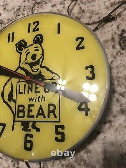 Vintage Line Up With Bear Electric Clock Gas Oil