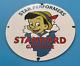Vintage Standard Gasoline Porcelain Gas Star Perform Pinocchio Walt Disney Sign