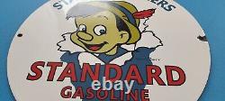 Vintage Standard Gasoline Porcelain Gas Star Perform Pinocchio Walt Disney Sign